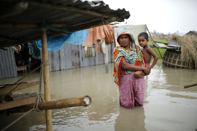 Should protection from flooding be a universal right? [Source: Abir Abdullah/EPA]
