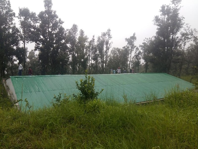 This rainwater harvesting tank on the hilltop above Nag village stores almost 400,000 litres [Image by Hridayesh Joshi]