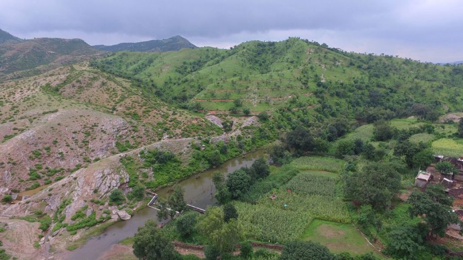 Degraded land, with parts restored by villagers working with the Watershed Organisation Trust [Image by: WOTR]