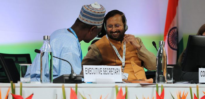 Ibrahim Thiaw, Executive Secretary, UNCCD (left), and COP 14 President, Prakash Javadekar, India’s Environment Minister, at the New Delhi summit [Image by: IISD/ENB]