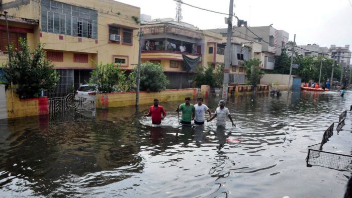In many parts of the city the water still remains stagnant in the streets [image by: Prashant Ravi]
